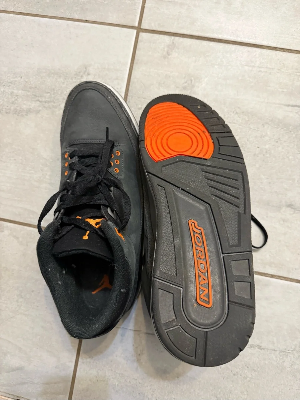 Jordan Men’s Black Sneakers with Orange Accents